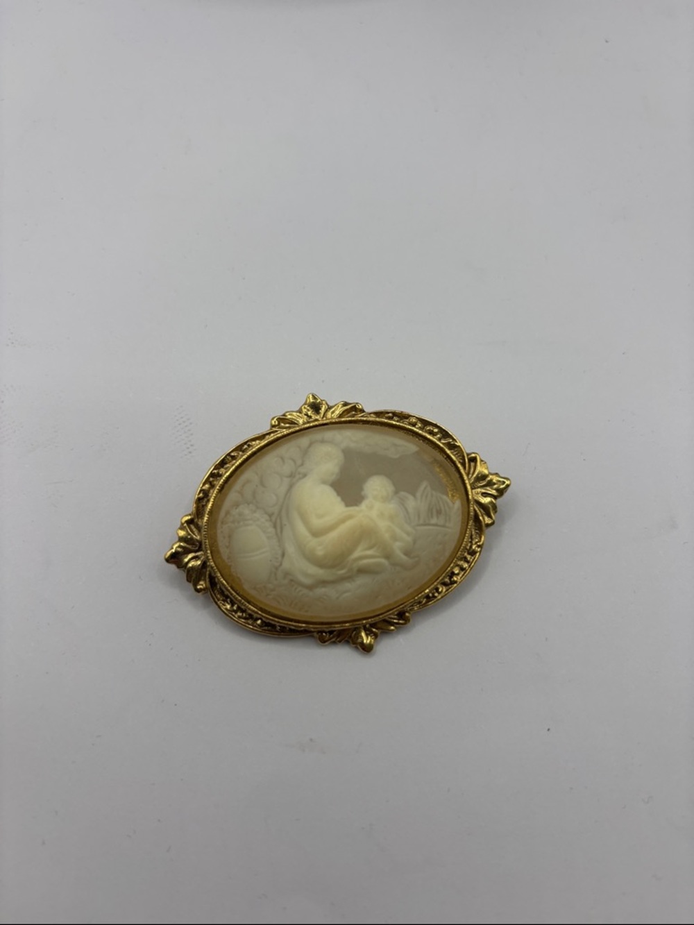 1928 Gold-Tone Mother and Child Ivory Brooch